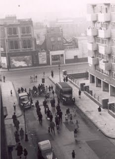 Scovell Road looking West from bedroom window of flat 233 Scovell Rd c1958. War damaged pub the Britannia can be seen along with Lew’s Fish & Chip Shop..jpg