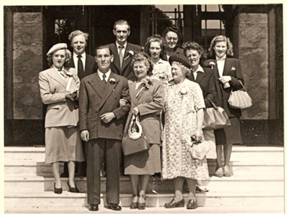 Billy Oliver & Elsies Wedding.Mary left,George at back with Kathy in middle..png