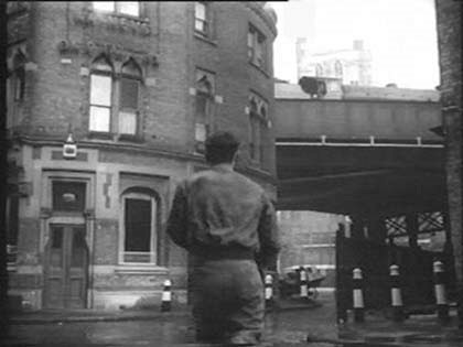 Film Pool of London 1951 Southwark Cathedral looming over the railway arch. Stoney Street. Bedale Street and Green Dragon Court..jpg