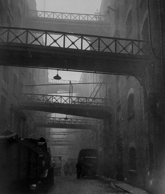 Shad Thames, a street between warehouses in Bermondsey c.1936.jpg