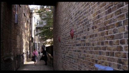 FILM A FISH CALLED WANDA 1980.Wanda and Otto come into view. Facing east on Rotherhithe Street as it runs between St. Marychurch Street and Elephant Lane in SE16. X.jpg