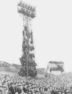 Millwall 1956-57 Cup tie v Newcastle at the Den. a record crowd of 45,646. I was there  X.gif