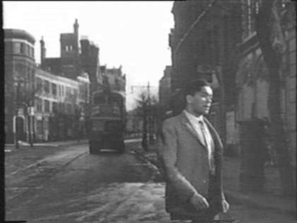Film Pool of London, 1951, Tooley Street with Vine Lane behind right, heading towards Tower Bridge Road. I think that is Shand Street on the left..jpg