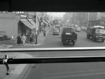 Film Salvage Gang 1958.Old Kent Road, just past Penry Street looking south east. The opening on the left-hand side is to a garage..jpg