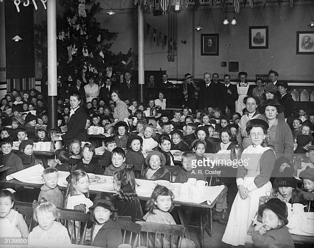 Old Kent Road c1919, children ready for a meal during a Waif's Festival at St George's.jpg
