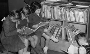 Spa Road, a group of children reading quietly in the ‘Toddlers’ Corner’ of Bermondsey public library, 1950.jpg
