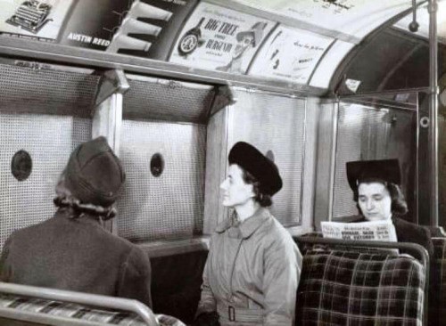 A wartime tube carriage with anti-splinter window netting..jpg
