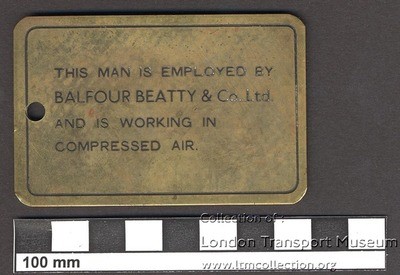 Elephant & Castle station, 1937. Safety token issued to contractors working in compressed air.jpg