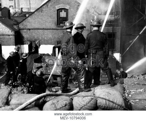 Grange Road, Firefighters at work at a fire at Young's Glue Factory in the Second World War, 12 October 1940..jpg