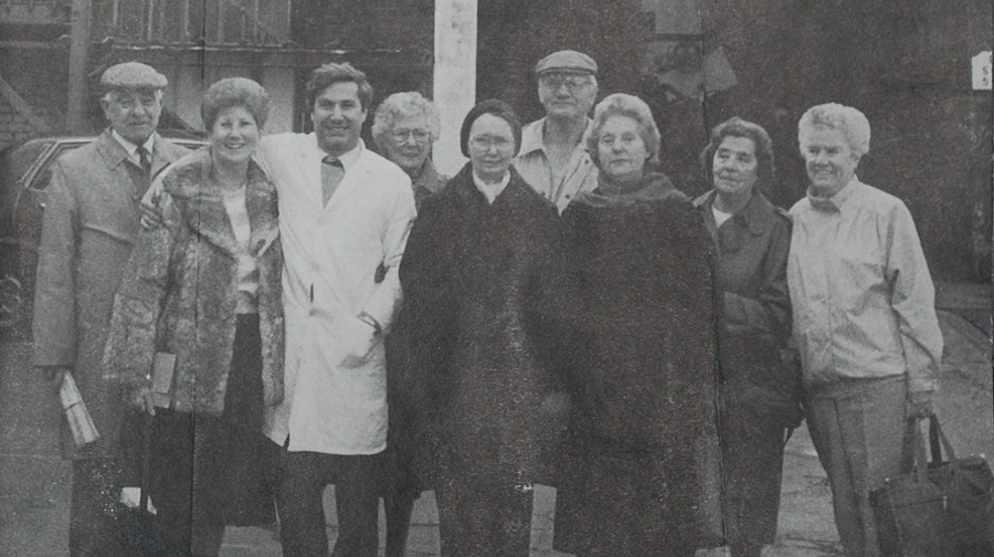 Mary Gibson's mother, also Mary Gibson, pictured third right, and aunt Nell Halstead, second left, pictured revisiting the Alaska fur factory in Bermondsey in 1988,both worked there at one time..jpg