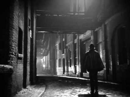 Clink Street looking west towards Southwark Bridge, Southwark. From the 1952 film The Hour 13..jpg
