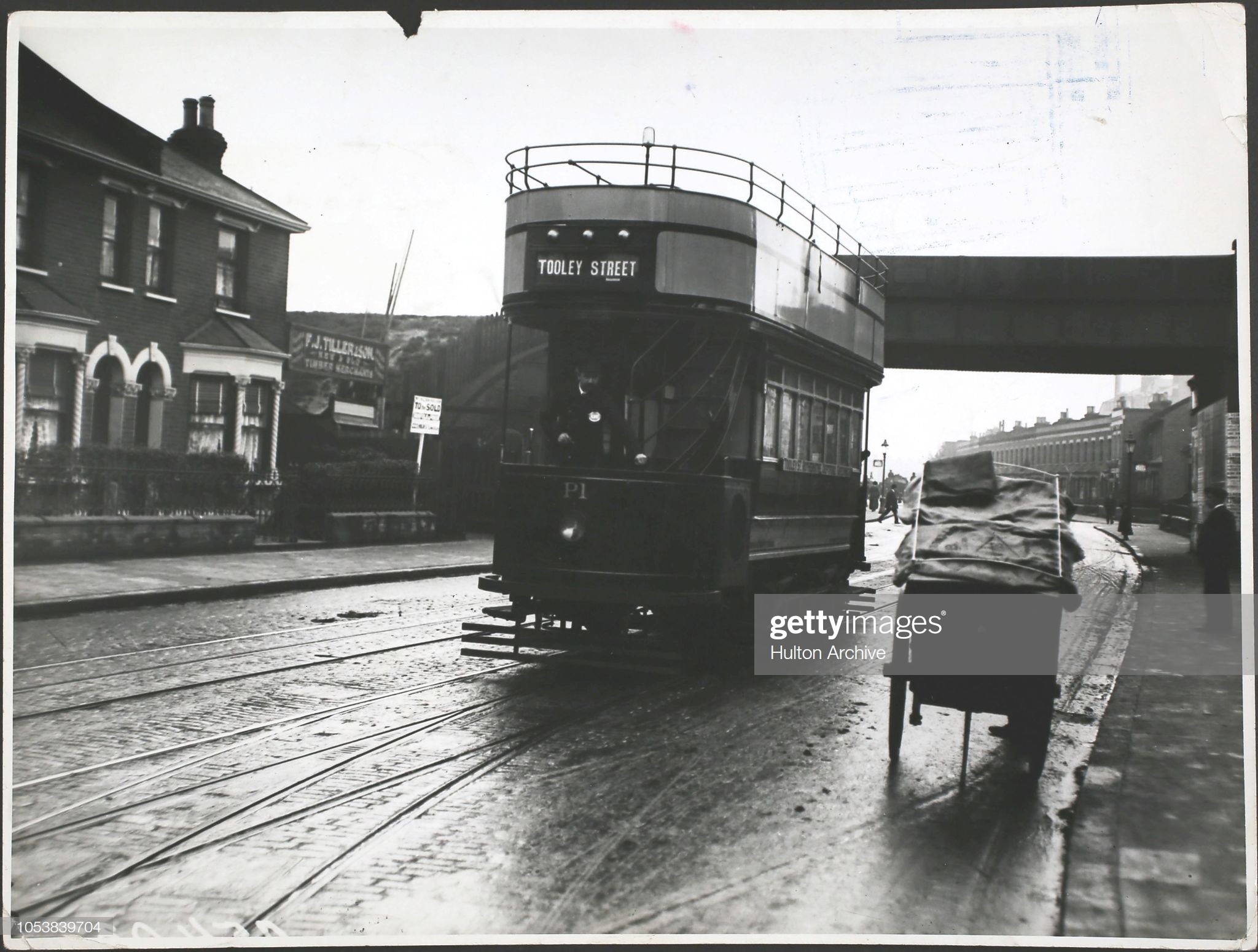 An LCC petrol-electric tram bound for Tooley Street in 1913. X.jpg