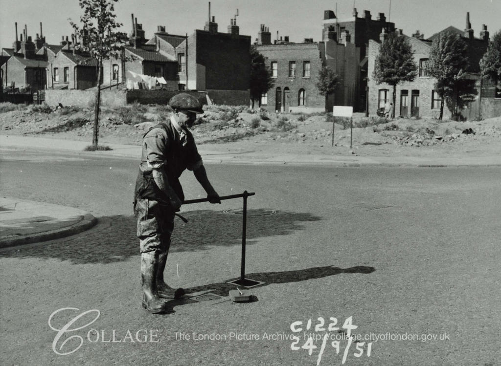 Spa Road Sewer, man conducts maintanence work 1951.  X.png