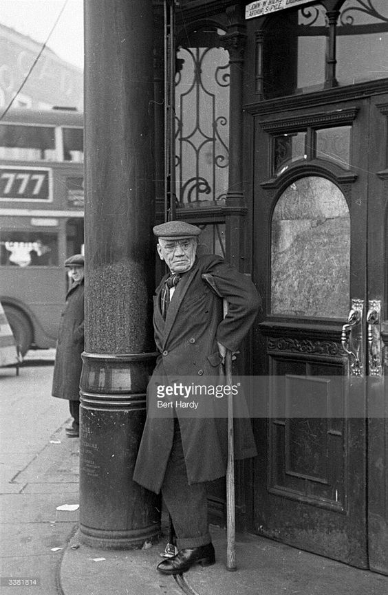 Elephant and Castle,1949. An elderly resident of Southwark resting outside a pub.  X.png