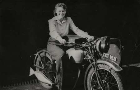 London Transport motorcycle dispatch rider Jill Horscroft at Camberwell bus garage, 1940 – 1945.png