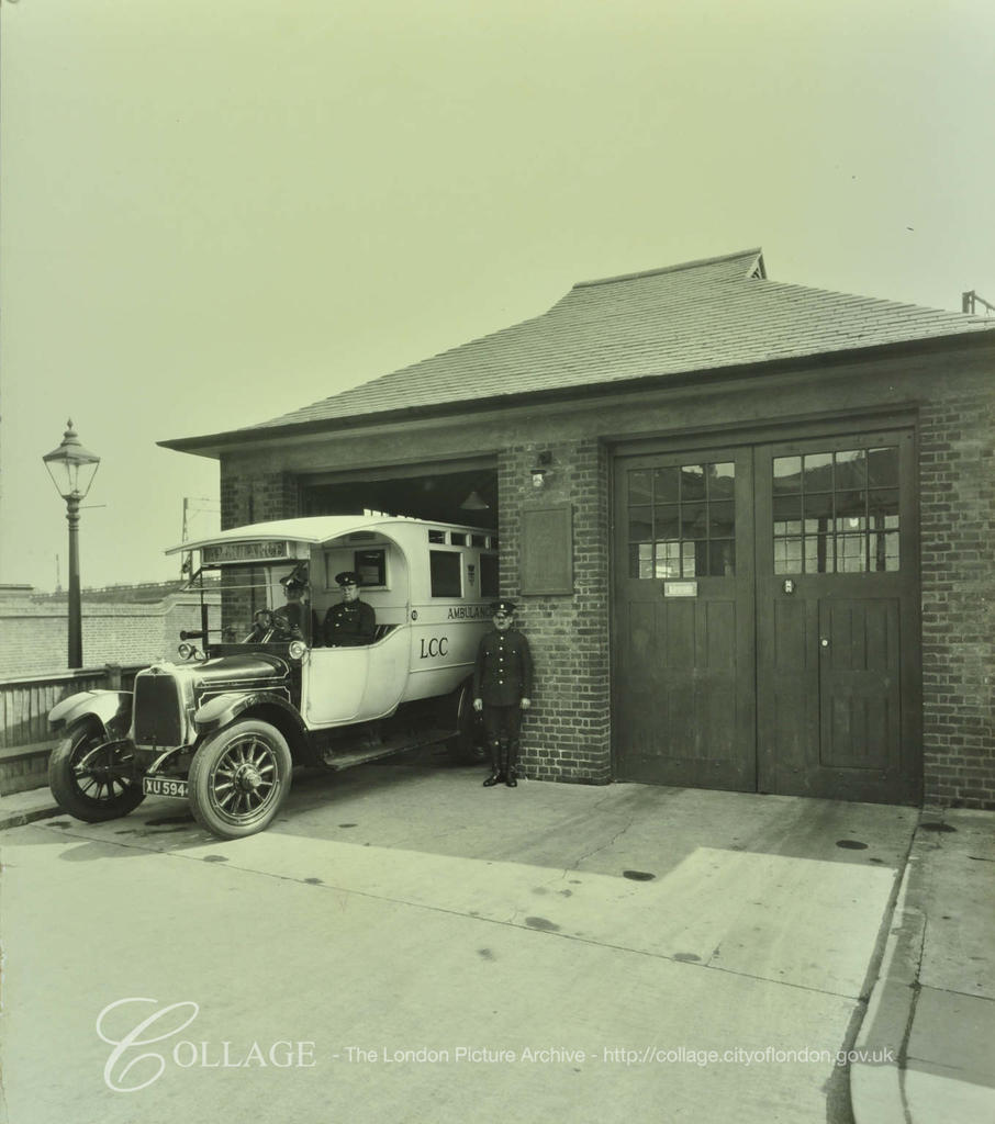 Ilderton Road Ambulance Station, an ambulance emerges from the garage,c1929.  X.png