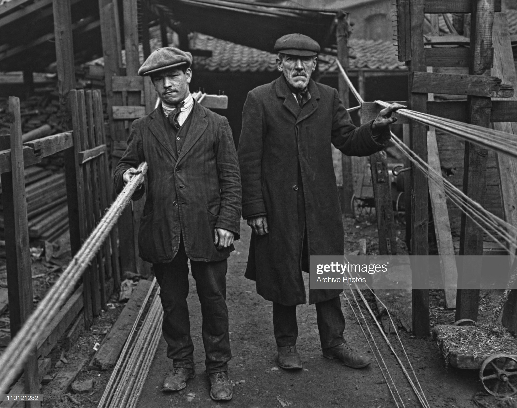 Tabard Street,Rope maker George Dryden (right) with his nephew on the ropewalk in Tabard Street, where they manufacture their products, circa 1920.  X.png