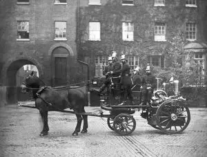 Southwark Bridge Road. A horse-drawn steamer and crew at Southwark fire station, during the latter years of the Metropolitan Fire Brigade (it was renamed the London Fire Brigade in 1904).  X.png