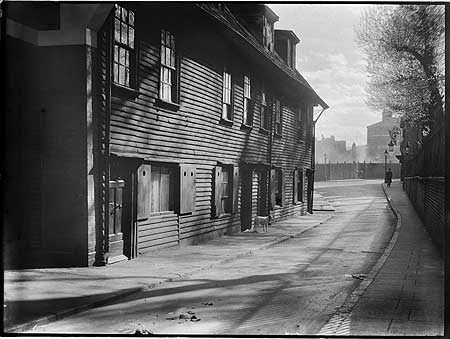 Columbo Street now Collingwood Street, looking south-west, showing weatherboarded cottages on the east side of the street  c1930s.   X.png