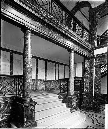 Tooley Street, an interior view showing marble floors, stairs, columns and walls in the hall of the Mark Brown's Wharf office, 1922..png