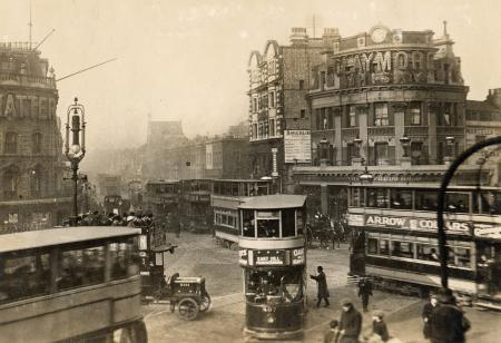 Elephant and Castle by the Alfred's Head public house and the Bakerloo line station, c1920..png