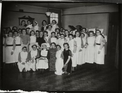 Lower Road, St Olave's Hospital 1942. A group of nursing staff and a retiring sister.  X.png