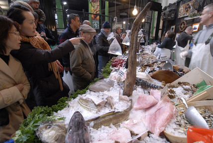 Borough Market, people buying fish on a stall in 2008.  X.png