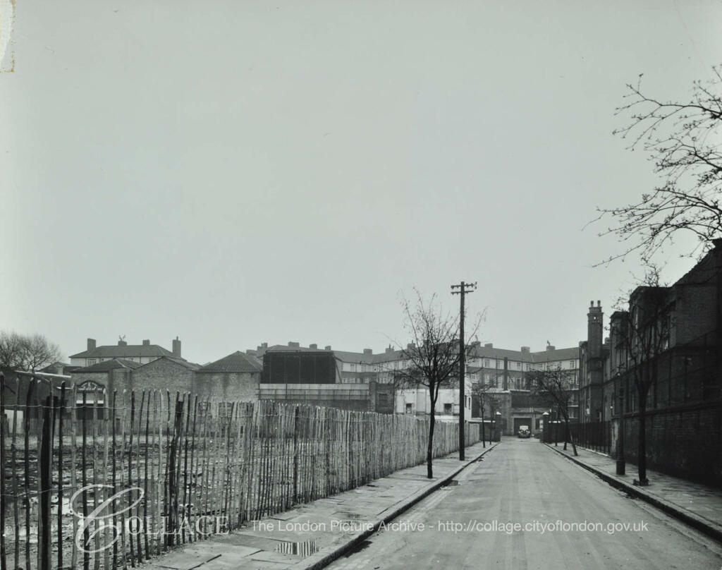 Clack Street, Rotherhithe, looking south towards Albion Street. On left is vacant site formerly occupied by a school. c1952.  X.png