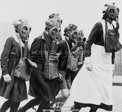 Schoolchildren wearing gas masks, 1 November 1934.  X.png