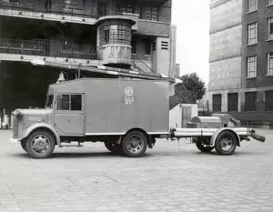 A towing vehicle and trailer pump from 38 A 2V, a Bermondsey sub-station located at Paragon School, Searles Road, London SE1. The picture was taken at the Regional Headquarters, Lambeth. WW2.  X.png