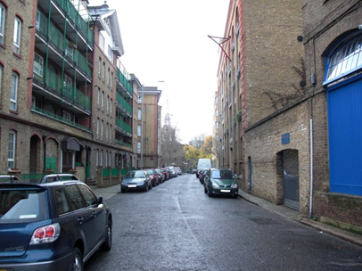 Rotherhithe Street, Rotherhithe, c1970.  Royal Standard Pub, site of, would have been about where the grilled door is on the right. c2009.  X..png