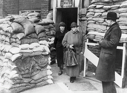 Two women leaving the Peacock Street school in Southwark, where they voted during World War II.  X.png