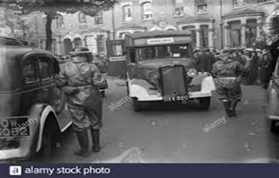 Old Kent Road. Air Raid Precaution exercise, a Bedford ambulance taking part in the drill c1939.  X.png