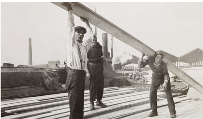 Surrey Docks c1930, men moving timber.  1  X.png