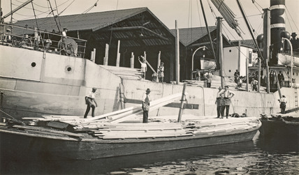 Surrey Docks, c1930, steamer unloading cargo.  X.png